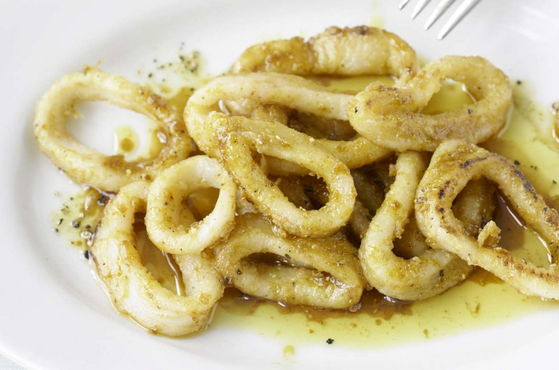 Calamars avec vinaigrette au curry